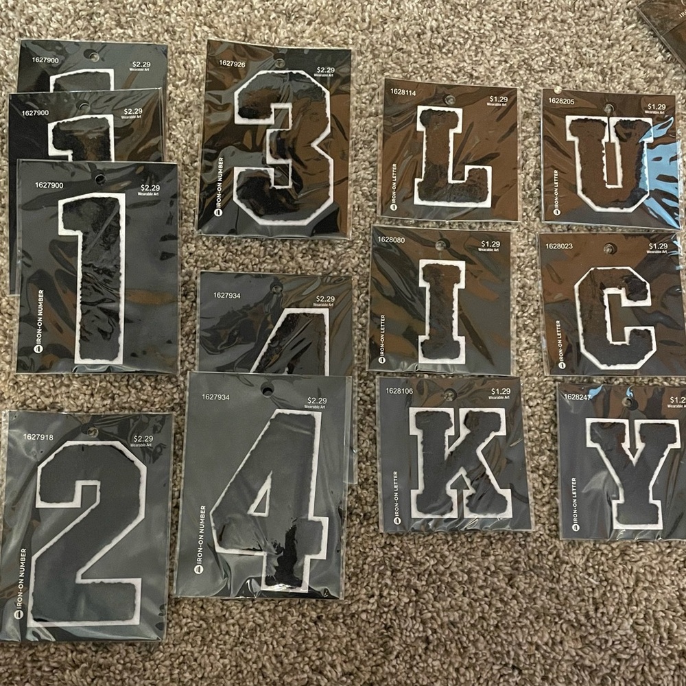 Gallon bag of various iron on/sew on numbers and letters